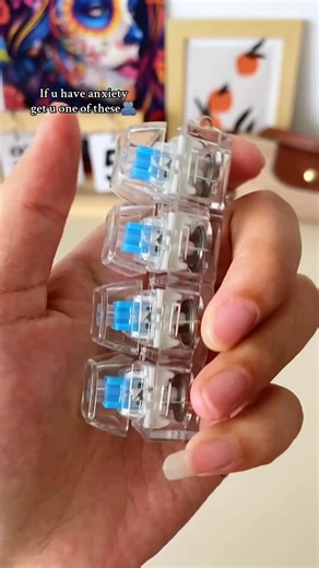 Desk gadget collectors, rejoice! 🎉 ⌨️ Add this 2-pack of mini keyboard fidget clickers to your collection and level up your stress-relief game. Each set includes one black and one white transparent 4-key fidget that delivers a satisfying mechanical click. 🔄 Click, press, relax - it's the perfect way to unwind at work or on-the-go. Plus, they double as switch testers for you keyboard hobbyists out there! 🛠️ Durable design meets customization options: swap keycaps and switches to experiment wit