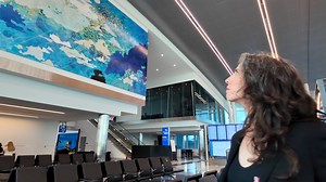 Hanging from the mezzanine level in the newly opened #CLTairport Concourse A Phase II, is Val Britton's 950-square-foot installation, "Where Earth Meets Sky." The Portland, Oregon based artist created a piece featuring digital prints, paint and collage on birchwood panels. It is a combining of aerial views, mapping, topography and research into the history and landscape of Charlotte. Red clay from the area was used in the paint for an additional touch of local flair. Discover more: bit.ly/CLTair