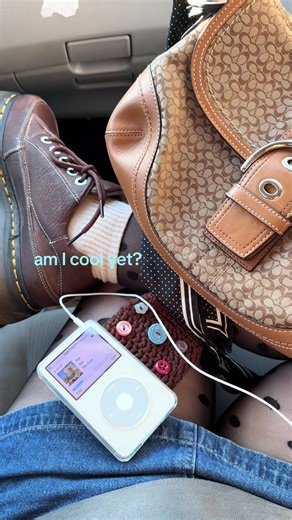 sorry I’m insufferable (also I want everyone to know that egg is in my top favorite songs of all time) #ipod #coachbag #polkadot #buttons #miniskirt