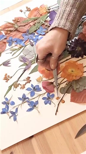 Just a few minutes of my day... When it comes to pressing and preserving your wedding flowers there are 3 stages... 1)... Take your bouquet apart and deconstruct, pressing each petal, leaf and stem individually to achieve optimum results... This on average takes around 6 weeks... 2)... Reconstruct each flower glueing petals back together to recreate each flower then colour correct to bring back the flowers natural colour and help prevent fading... 3)... Make your floral art... I play around for 