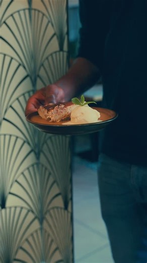 Why Tiramisu at a Somali restaurant? Strange… but true. Italian influence has always existed in our food story, and like everything at Sabiib, we made it our own. Freshly layered in house by our team. Non alcoholic. Finished with warm caramel sauce for that buttery melt. Served with smooth vanilla ice cream. From Timir Date Cake to our signature Tiramisu, our desserts are made for slow conversations, meet ups, and the perfect ending to a Somali dining experience. This is dessert with culture. Th