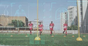 Animation of interface processing data over diverse group of male football players training in field. Sports, competition, fitness and technology concept digitally generated video.