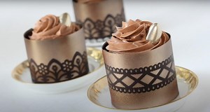 770K views · 2.4K reactions | My chocolate craze continues with this blast-from-the-past video! I filled these elegant stenciled chocolate cups with buttercream-topped cupcakes, but they can contain just about anything. You can also airbrush them in infinite ways! Perfect for a special Valentine’s Day dessert with your special someone! ENJOY THE COMPLETE TUTORIAL ON YOUTUBE: https://youtu.be/8FWqZU2OsVc | Julia M Usher | Facebook
