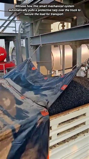 Automatic Tarp System Covering A Heavy Load Of Materials