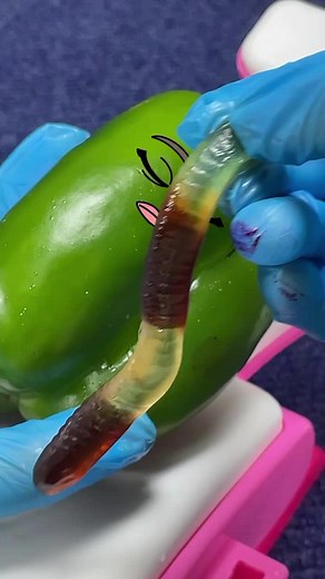 Animation of a Green Capsicum Being Bitten by a Snake