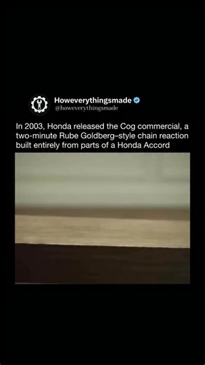 How Everything Is Made on Instagram: "In 2003, Honda released the Cog commercial, a two-minute Rube Goldberg–style chain reaction built entirely from parts of a Honda Accord. Every movement was real, with no CGI or digital effects used. The ad required months of planning, meticulous engineering, and dozens of resets to capture a single perfect take. Its message was simple: precision in every component matters. The commercial went on to become one of the most acclaimed advertisements in automotiv