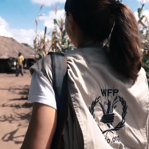 What does it take to reach 100 million people with food assistance every year? It all starts with the commitment, courage, and determination of WFP's 20,000 staff, who are saving lives in times of conflict and changing lives in times of peace.💙 #NobelPeacePrize #FeedingPeace | World Food Programme