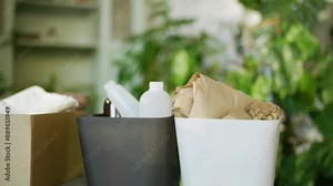 waste sorting at home, sorting rubbish for recycling and preparing second-hand clothes. plastic, paper and cardboard, clothes. packaging materials. environment, zero waste