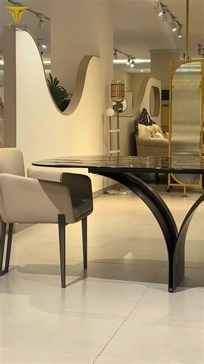 T World Furniture on Instagram: "🌊 From the liquid-like glass surface to the bold architectural base, this table brings a high-end gallery feel right into your dining room. . Comment PP for more details. . #InteriorDesign #ModernFurniture #DiningTableGoals #GlassFurniture #LuxuryLiving #HomeDecor #glassdiningtable #FurnitureDesign #TWorldFurniture"