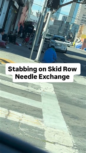 Joey Tuccio on Instagram: "This is a video I took a couple of months ago in front of the needle exchange on Skid Row. Everybody is high, there is usually violence, I have seen many fights breakout, or people are just passed out like in this video. Today somebody was stabbed in front of the needle exchange. The criminal has not been caught. I do not understand why a needle exchange on Skid Row is even there. In an area that is already filled with crime and mental illness I don’t understand why th