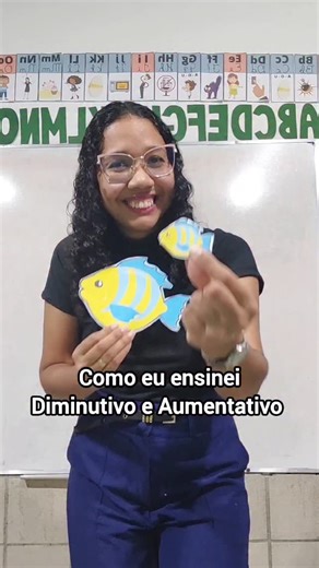 Como eu ensinei o Diminutivo e aumentativo para os meus alunos! Colei na lousa peixes de variados tamanhos, eles representavam os graus do substantivo: Normal, diminutivo e aumentativo. Pus palavras na caixa surpresa e as crianças após a leitura deveriam colocá-las no local corretamente classificando-as se pertenciam ao grau aumentativo ou diminutivo. Chamei outros alunos para escreverem as palavras no grau normal. Depois, espalhei figuras pela escola e ao encontrar cada figura eles preenchiam s