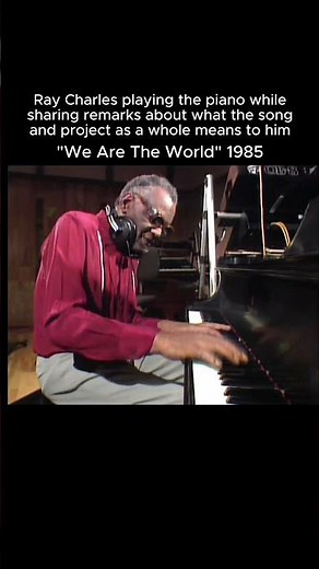 Ray Charles playing the piano and emphasizing the meaning of the song