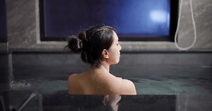 Woman enjoy onsen bath in the resort
