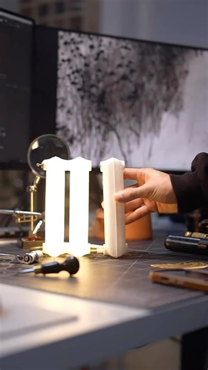 Product Design on Instagram: "This 3D printed modular radiator lamp by Tobo Bolimond is more than just a light source—it’s a piece of interactive design. Made of magnetically connected modules, the lamp invites playful customization, letting you adjust its shape effortlessly while it remains fully functional. As it lights up, it emits a soft ambient glow that transforms the atmosphere of any space. Blending technology with tactile design, this piece sparks joy and interaction, even on the gloomi