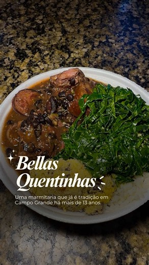 ✨ Comida caseira, preço justo e muito borogodó. Tem como não amar? No meio da correria das gravações eu precisava almoçar... e acabei descobrindo uma marmitaria que já é tradição em Campo Grande há mais de 13 anos: a Belas Quentinhas. E, claro, não consegui escolher só uma quentinha. 😂 Provei a feijoada completa que tem toda sexta-feira (R$ 29 com Guaracamp grátis), a parmegiana e a costelinha de porco... e posso dizer que as três passaram no Pitaco da Mana! É aquela comida caseira de verdade, 