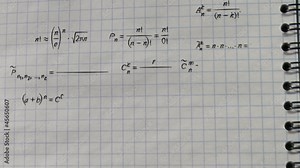 math physics formulas on squared exercise book flying camera