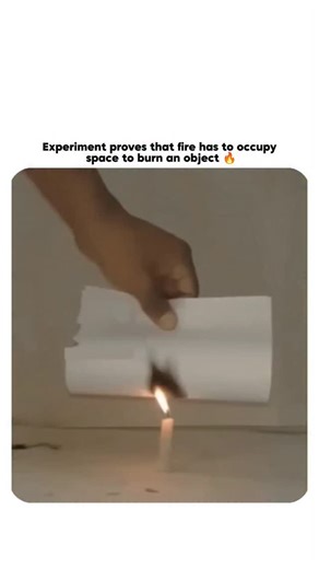 2AM___friendship on Instagram: "Fire looks simple, but this experiment reveals the hidden science behind every flame 🔥🧠. Burning isn’t just about heat touching an object—it’s a chemical reaction that needs space, oxygen, and fuel working together. When the paper is held close to the flame, the fire can’t spread freely because combustion gases need room to expand and mix with oxygen. Without that space, the reaction slows or stops. This is why flames change shape in tight environments and why f