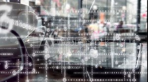 Coffee shop data array. Grid or matrix of electronic numbers overlaid on a close up of a phone on a coffee shop table.