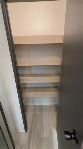 2026 Cardinal 32LIVE ❤️✨ This fifth wheel blends residential comfort with all the style you want on the road. The rear living area is warm and inviting, featuring a hide-a-bed sofa and theater seating — perfect for relaxing after a long day. In the kitchen, you’ll find an island with a flip-up extension, a dedicated coffee bar, and a walk-in pantry that’s every organizer’s dream. ☕🍳 Up front, the private bedroom offers a king-size bed, dresser, and walk-in wardrobe, giving you all the comfort o