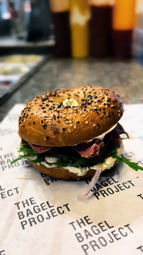 The Ultimate Salt Beef Bagel: Savory Delight with Cream Cheese, Rocket, Pickles, and More!