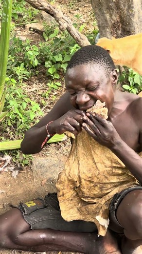 Hadzabe Tribe bushmen Chabba always share with dogs in his traditional lifestyle in the bush 🥰