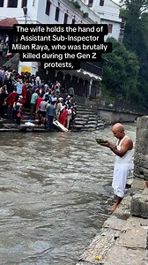 The wife holds the hand of Assistant Sub-Inspector Milan Raya, who was brutally killed during the Gen Z protests, | Laxmi Prasad Ngakhusi