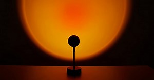 Urban Shop's new Sunset Projector Lamp casts a unique lighting effect for an affordable price