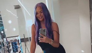 Chrissy Teigen Has Purple Hair Now, But It’s Just a Wig!