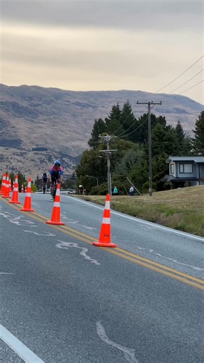 Frederic Funk chasing down Ivan Abele for the lead at Challenge Wanaka - not sure he managed to take in that view!! #challengefamily #everyathleteeverychallenge | Challenge Family