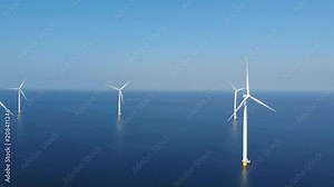 Windmill park offshore and onshore in the Netherlands, huge windmill farm at the Noordoostpolder Flevoland