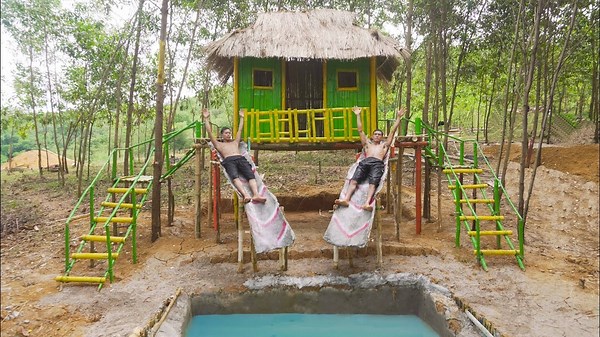 BUILDING A HOUSE ON STILTS SWIMMING POOL WATER SLIDE | Primitive Survival