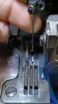 Changing the needle on an industrial overlock machine #sewing #handsewing #sewing #sewingeveryday