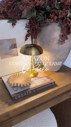 Amazon Cordless Brass Table Lamp On Sale 🔗Type, PLEASE SHARE INFO, for affiliate links, or shop this post via the Amazon link in my bio | https://amzlink.to/az0ZX7ZNHPiPp This cordless brass table lamp is one of those pieces that instantly elevates any surface. The warm brushed gold finish, sleek dome shade, and soft ambient glow make it perfect for console tables, entryways, nightstands, coffee tables, or styled shelves — no outlet required. Because it’s rechargeable and portable, you can move