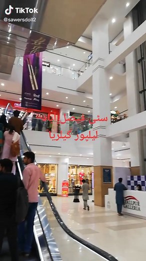 Exploring a Vibrant Indoor Shopping Mall Experience