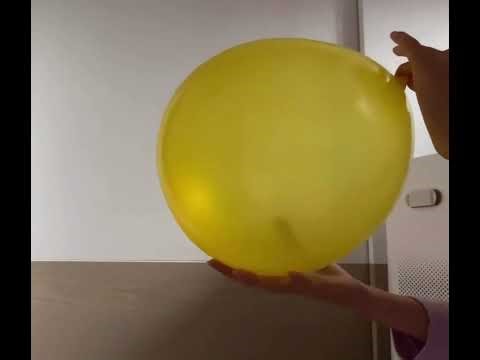 Blowing a balloon to pop!