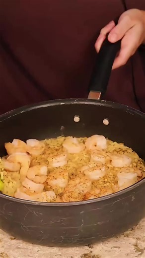 'One Pot Lemon Garlic Shrimp and Rice from @Budget Bytes #dollartreedinners #onepotrecipe #lemongarlicshrimp #onepotdinner #skilletdinner #shrimprecipe #weeknightdinner #budgetbytes' | ED Dougherty