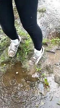 Eliza in white sneakers muddy