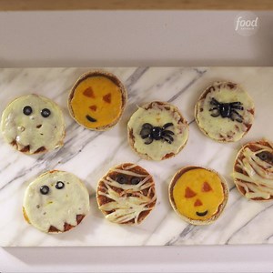 447K views · 1.8K reactions | Before the sugar rush hits, make these Halloween Party Pizzas for the kids! Catch up on Mom-Wins with Bev Cooks: https://foodtv.com/2QYuCAY Save the recipe: https://foodtv.com/2AfTGhr | Food Network | Facebook