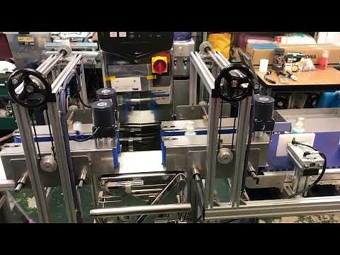 ボトル搬送用サイドベルトコンベア