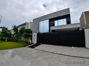 HOUSE. FOR. RENT Syed Brothers presents 1 knal Modern Artistic HOUSE in DHA phase 5 Lahore. For Demand : 0321-3444450 (HD video) State Of The Art House With Modern Elevation - Practical Lay Out Plan - Double height lobby - 05 Master Size Bed Rooms With Attached Bath - Outclass Grills Design Of Stairs - Granite Used For Stairs With Solid Steel Work - Superb Lobby Design With Planters In The Middle - State Of The Art Fall Ceilings - Solid Media Walls With All Wood Work - Imported Chandeliers - Sol