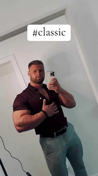 Men's Fitness Model Flexing Biceps in Classic Style