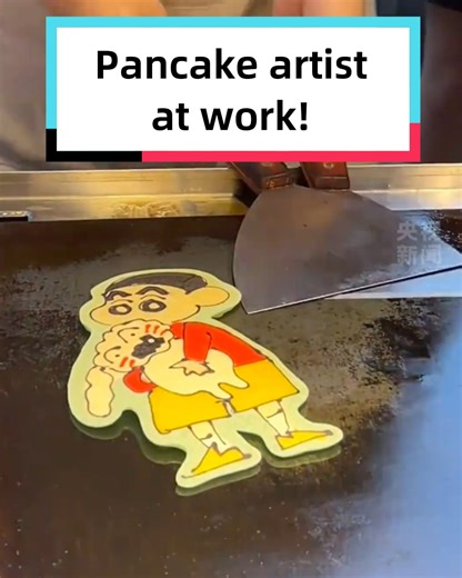52K views · 837 reactions | Wows all around! At a night market, a cartoon pancake stall went viral as the vendor blends her art school skills with pancake-making, drawing crowds with her hand-painted creations. | Discover China | Facebook