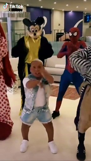 Dance Routine with Superhero Costumes in Public Space