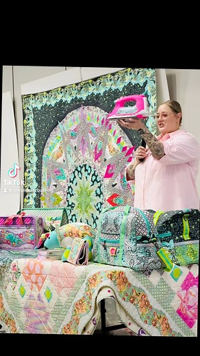 Tula Pink presents her new fabric and notions on stage today at Houston #quiltmarket #tulapink #tulapinkfabric #tulapinkroar #tulapinkroar #tulapinkiron #tulatroops #freespiritfabrics #canadianquilter #canadianonlinefabricshop | Purple KATZ Quilting