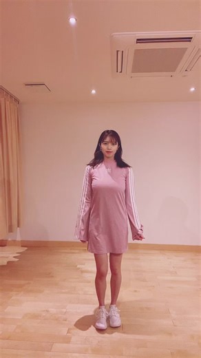 Dancing in a Pink Dress: Unique Moves at Home