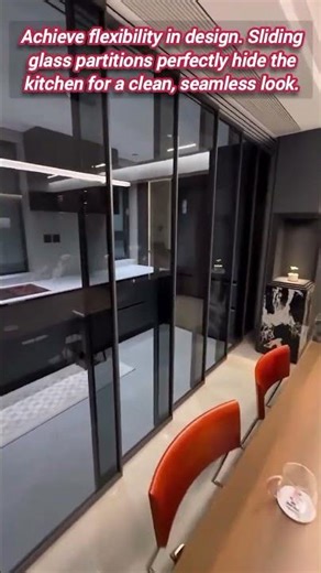 Sliding Partition Transforms Open Kitchen to Elegant Dining Room