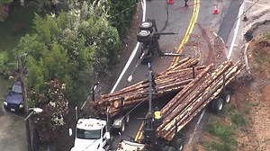 Highway 49 lanes blocked in Auburn after big rig with logs overturns