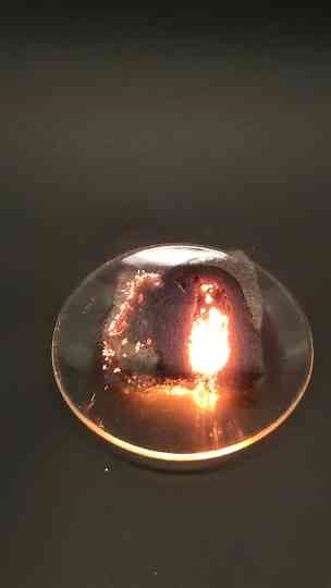 Pouring liquid oxygen onto steel wool