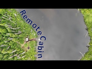 Father and Son Team Work Around Remote 1980's Log Cabin in the Rainy Alaskan Wilderness
