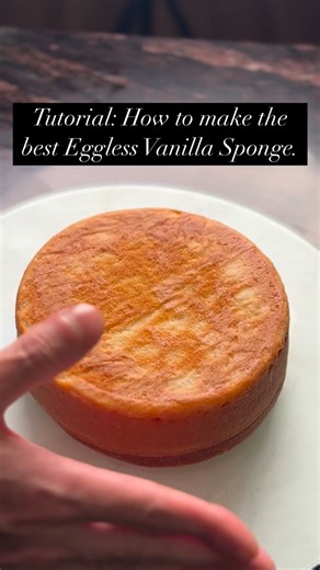 Best Eggless Vanilla Sponge Cake Recipe Details • Cake size: 6–7 inch round tin • Baking temperature: 170°C • Baking time: 30–35 minutes ⸻ Ingredients Dry Base • ½ cup (75 g) all-purpose flour • 1 tsp baking powder • ½ tsp baking soda Wet Mix • ½ cup yogurt • ½ cup powdered sugar • 1 tbsp condensed milk • 1 tsp vanilla extract • 1 tbsp vinegar • ¾ cup warm milk Add Later • 1 cup (150 g) all-purpose flour • ½ cup (125 ml) neutral oil ⸻ Method Preparation 1. Preheat the oven to 170°C. 2. Grease an